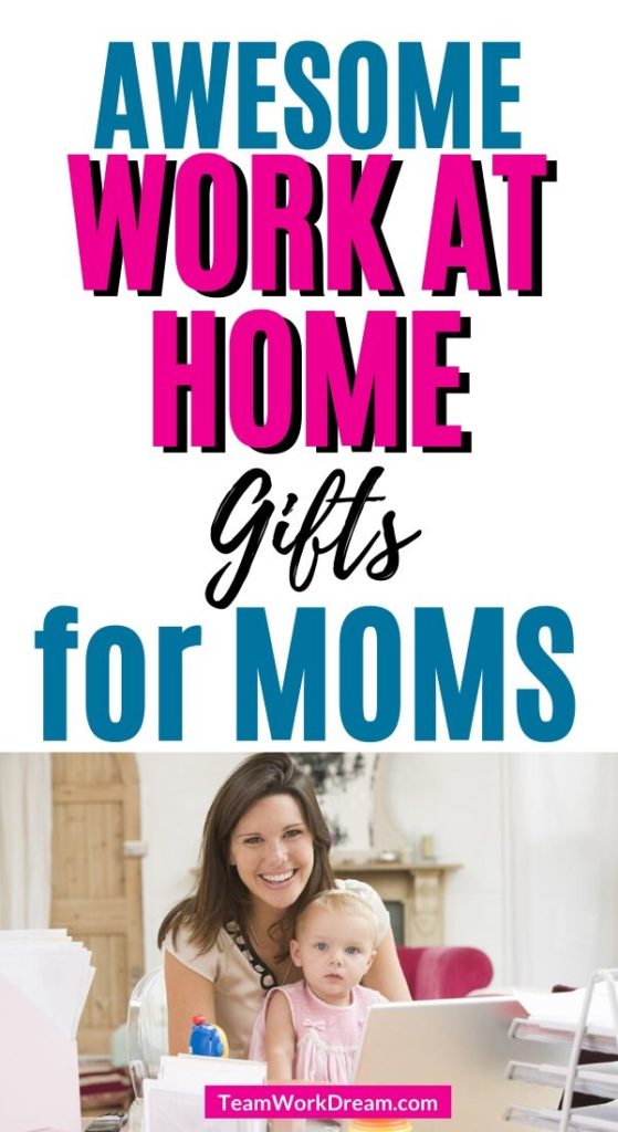 Woman working in home office with baby on lap working at home.
