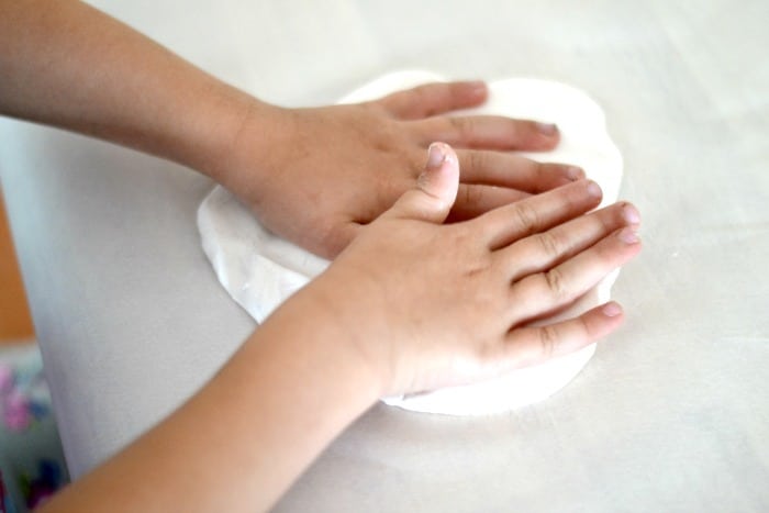 child playing with homemade play dough