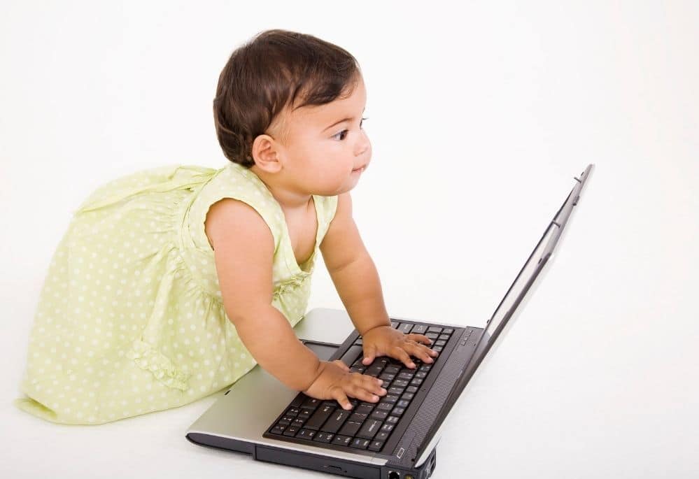 baby beginner on laptop finding entry level remote jobs