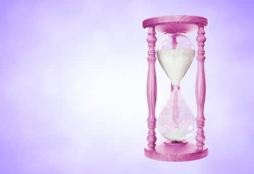 pink sand timer referring to 10 best work from home resolutions