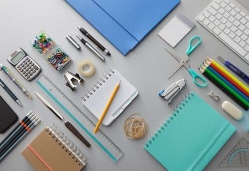 An fully organized work from home desk with stationery of all kinds all laid out for the second work from home resolution.