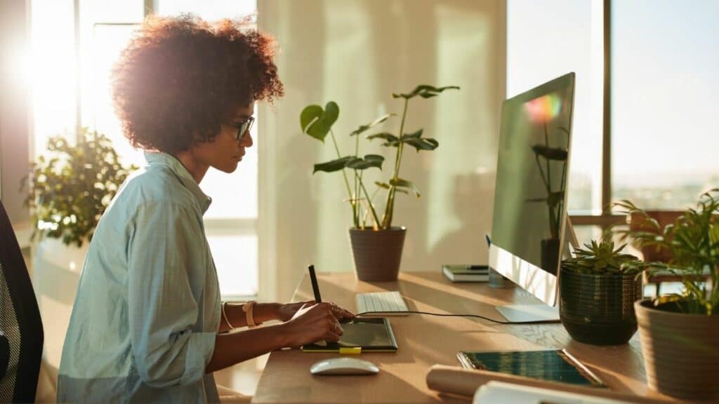 Woman sat working at a desk